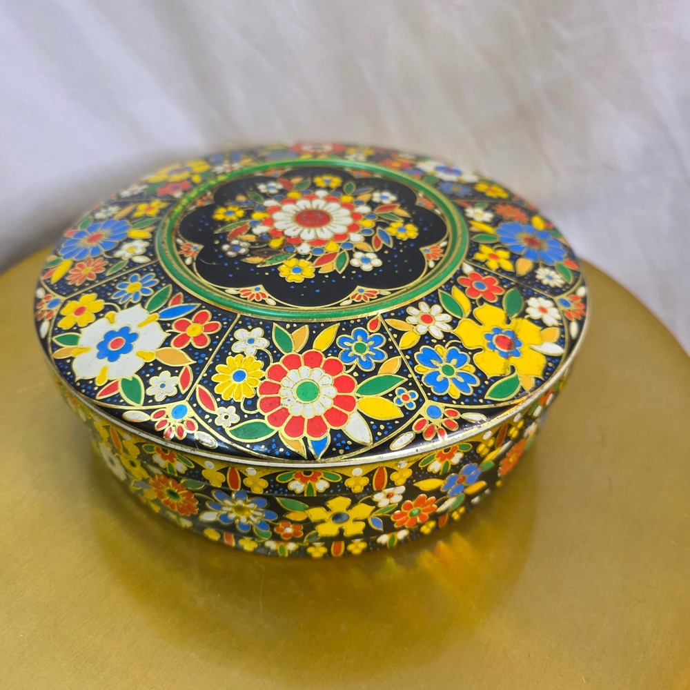 Vintage Daher Long Island NY Embossed Floral Tin Round Black Multi Color Metal